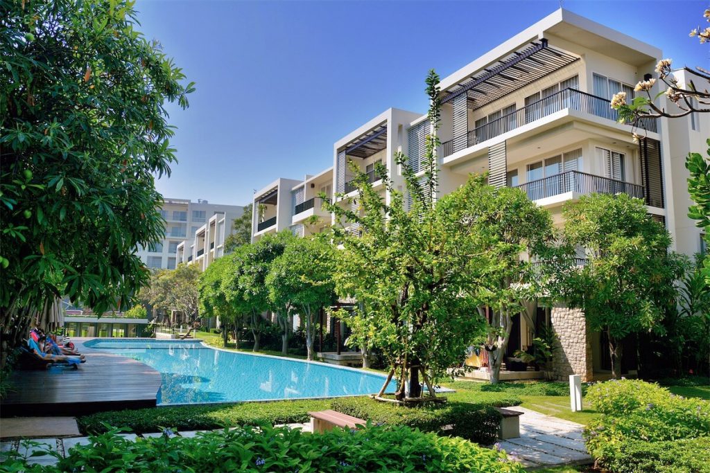 An executive condo (EC) in Singapore with condo-like facilities such as a swimming pool and balcony