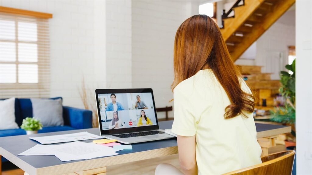 Woman working from home due to the COVID-19 pandemic - one of the reasons for a spike in HDB resale flats in Singapore as people yearn for more privacy to concentrate and work from home