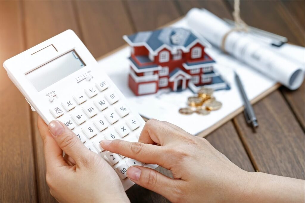Person calculating the cost of them forfeiting their BTO and purchasing an HDB resale flat due to HDB BTO delay in Singapore